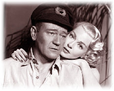 John Wayne and Lana Turner